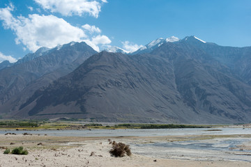 Pamir Mountains, Tajikistan - Aug 22 2018: Afghanistan and Panj river at Wakhan Valley View from...