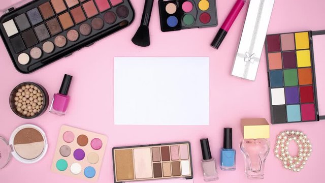 Make up products moving around the white paper for tittle or logo - Stop motion 