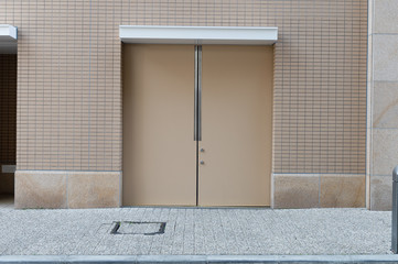 sidewalk by street wall & door