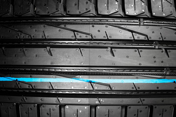 Car tire. Tire stack. Car tyre protector close up. Black rubber tire. Brand new car tires. Close up...