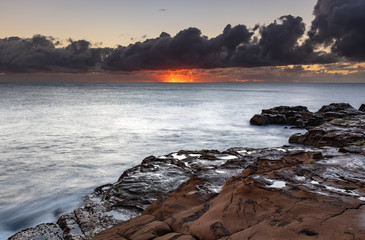 Sun Lights Up! Sunrise Seascape with Cloud Bank