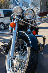 Fototapeta premium Close-up of motorcycle parked on city street