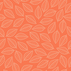 Vector seamless pattern with white leaves silhouettes on an orange