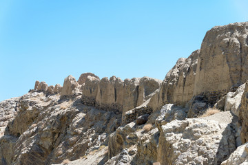 Fototapeta na wymiar Pamir Mountains, Tajikistan - Aug 23 2018: Ruins of Khaakha Fortress in the Wakhan Valley in Gorno-Badakhshan, Tajikistan. It is located in the Tajikistan and Afghanistan border.
