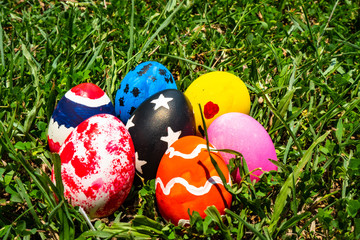 colored Easter eggs on the grass