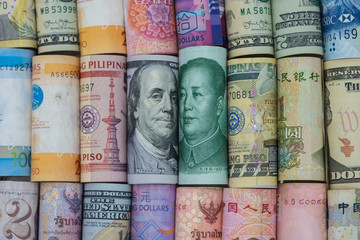 US dollar and China Yuan banknote  with multi countries banknotes. Its is symbol for tariff trade...