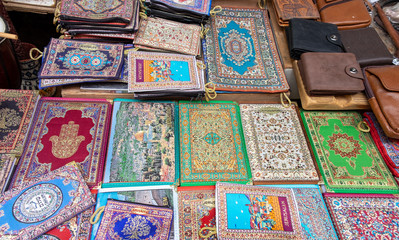Embroidered little bag for holy books for sale at old city market. Israel, Jerusalem