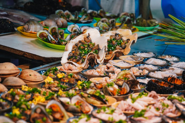 Street food at night in Phu Quoc island in Vietnam | Delicious seafood for tourist at market