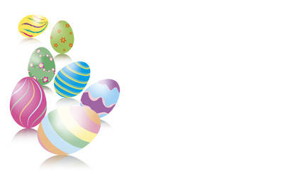 Kugelnde liegende und stehende pastellfarbige Ostereier