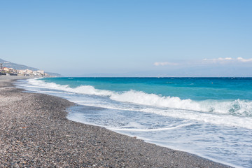 Waves Washing Ashore on a Black Sand Volcanic Beach in Sicily