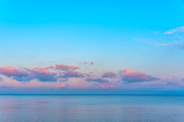 Obraz premium Mirror Still Mediterranean Sea on the Southern Italian Coast at Sunrise