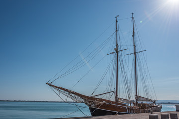 Fototapeta na wymiar Old Sailing Ship Docked in Sicily on the Mediterranean Coast