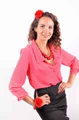 young girl with a red necklace, bracelet, hairpin on a white background