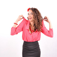 young girl with a red necklace, bracelet, hairpin on a white background.