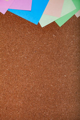 Corkboard with notes.