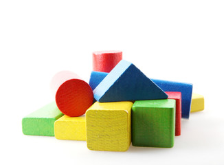 Studio Shot Of Colorful Toy Blocks Against White Background