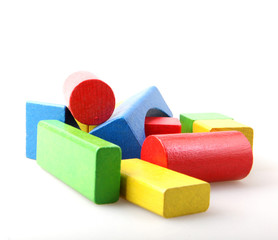 Studio Shot Of Colorful Toy Blocks Against White Background