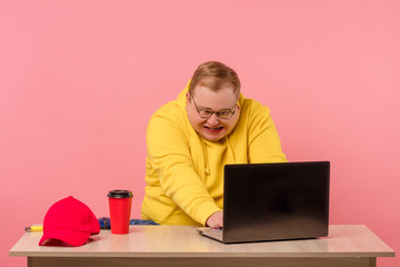 Education, work, overwork concept. Ridiculous, tired from work, mad man in yellow sports cloth look...