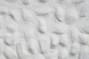 Obraz premium New decorative white relief plaster with rounded convex elements