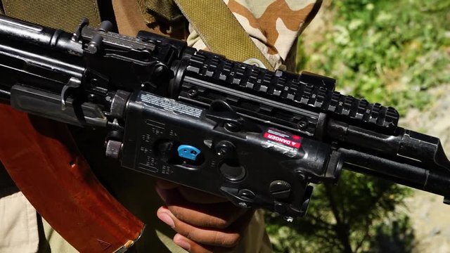 Close Up. Handheld. Pan Right.