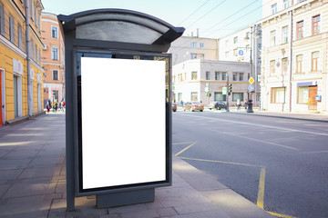 vertical advertising billboard ad in the bus stop. white box for placement in advertising banners....