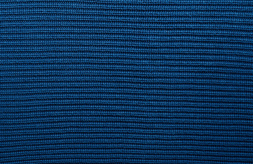 Blue or prussian blue knitted texture background