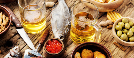 Lager beer and snacks