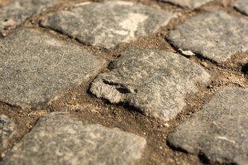 Broken stone of old cobblestones