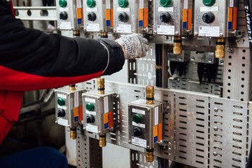 Worker repairs appliances