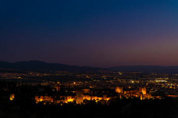 Fototapeta na wymiar 4k Amazing Alhambra At Dusk View. Palace and fortness complex. Granada, Spain