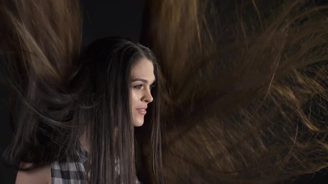 Woman throw up her hair