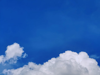 Group of Fluffy Clouds on Blue Sky