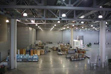 Top view of large warehouse with boxes