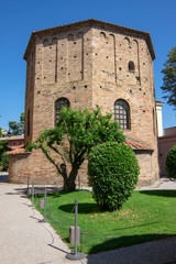 Fototapeta na wymiar Old beautiful medieval ancient round italian red brick bell tower in Ravenna