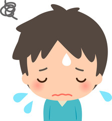 落ち込んでうつむく若い男性