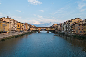 Fototapeta na wymiar Ponte Vecchio bridge and architecture along river Arno in Florence, Tuscany, Italy