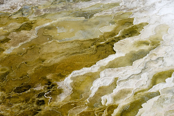 water in the river with the colorful texture of sand
