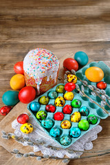beautiful Easter still life. colored eggs,  traditional Easter cake. spring season. Easter holiday scene. cake, eggs - traditional Easter food