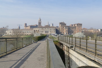 Fototapeta na wymiar Mantova skyline from the end of St. George bridge
