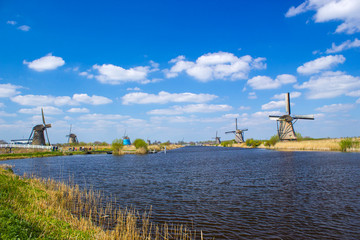 rural lanscape with windmills at famous tourist site Kinderdijk in Netherlands