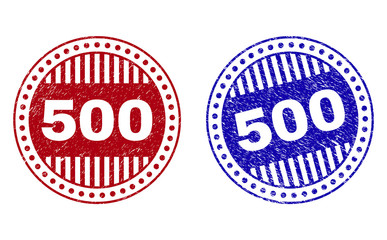 Grunge 500 round stamp seals isolated on a white background. Round seals with grunge texture in red and blue colors. Vector rubber imitation of 500 caption inside circle form with stripes.