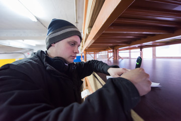 carpenter writing a receipt