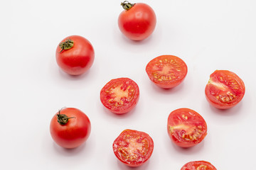 Close up red tomatoes on isolate white background.Selective focus red tomatoes.