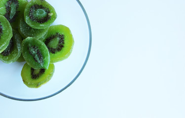 Fototapeta na wymiar Dried kiwi fruit vegan hand food