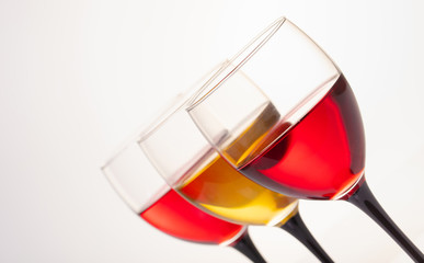 white and red wine in glasses