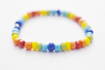 Glass Beads Bracelet Rainbow on White Background, Isolated Beads on White Background, Glass Beads...