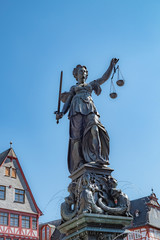 silhouette of fountain Lady justice in Frankfurt