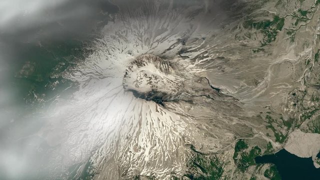 Satellite aerial view of volcano and moving clouds, Mount st Helen in Washington state. Contains public domain image by Nasa