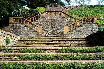 Fototapeta na wymiar English manor house garden stairs