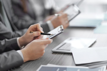 Close up.the background image of a business team discussing a financial plan